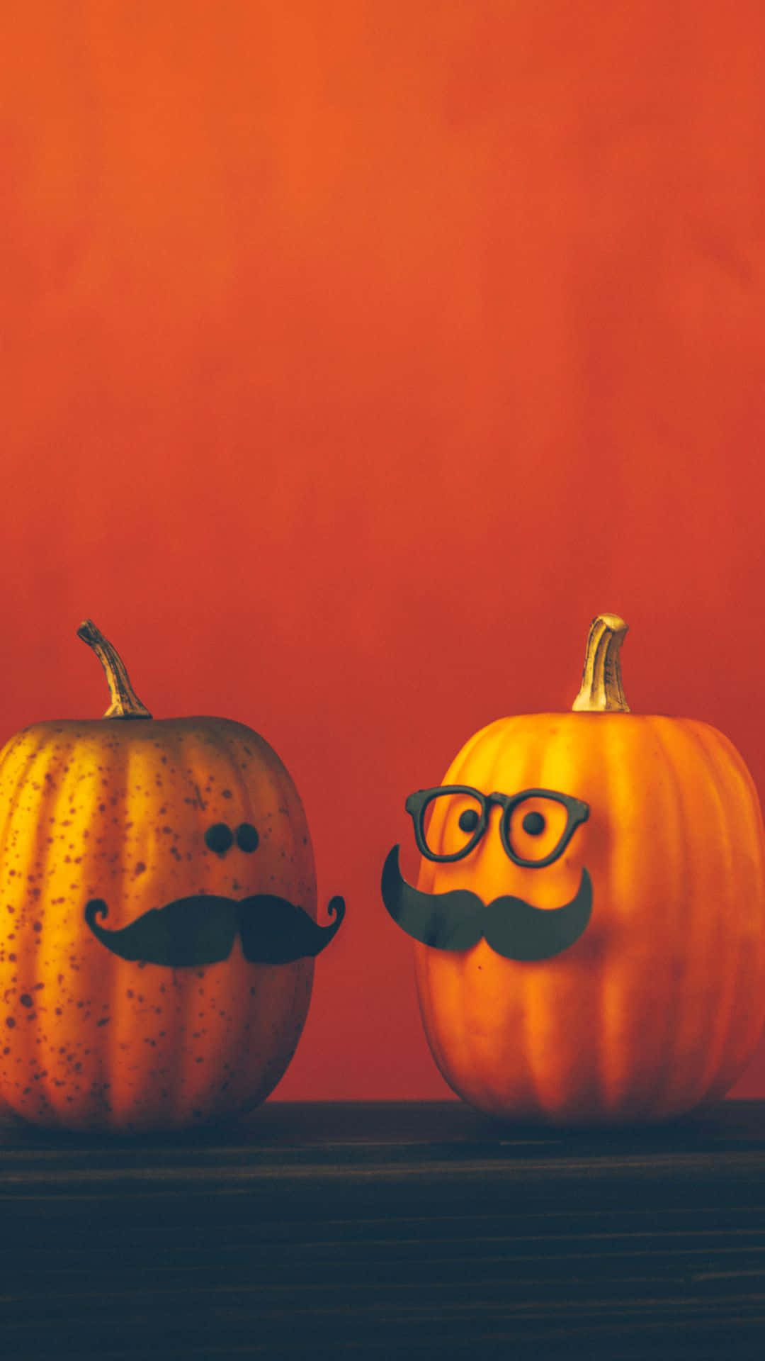 Adorable Smiling Pumpkin On Fall Leaves