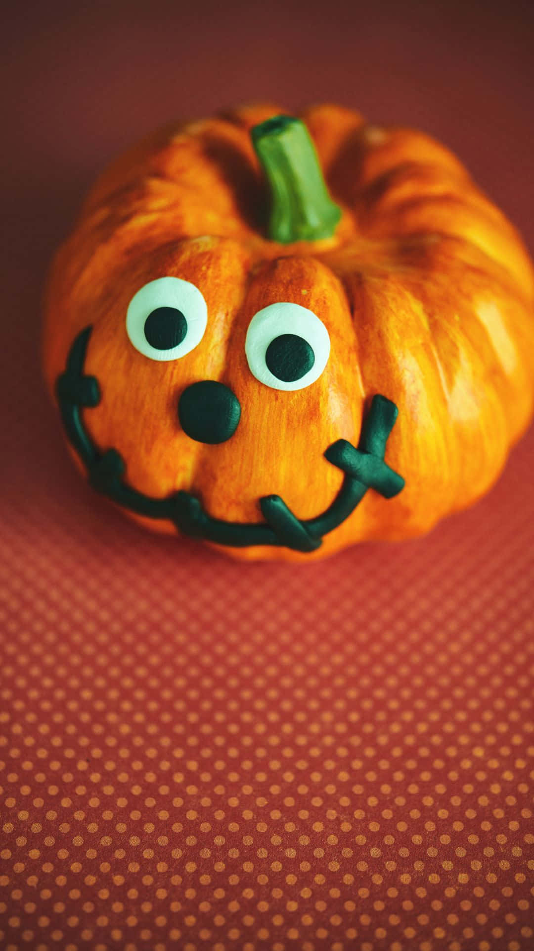 Adorable Smiling Pumpkin With Autumn Leaves