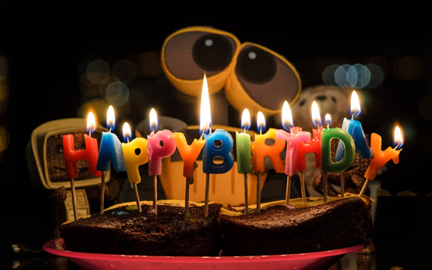 Adorable Wall-e Birthday Cake With Candles Background