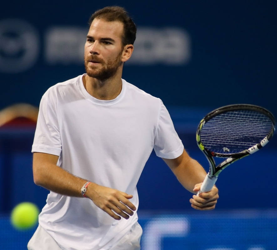 Adrian Mannarino In Action At The Sofia Open Tennis Tournament Background