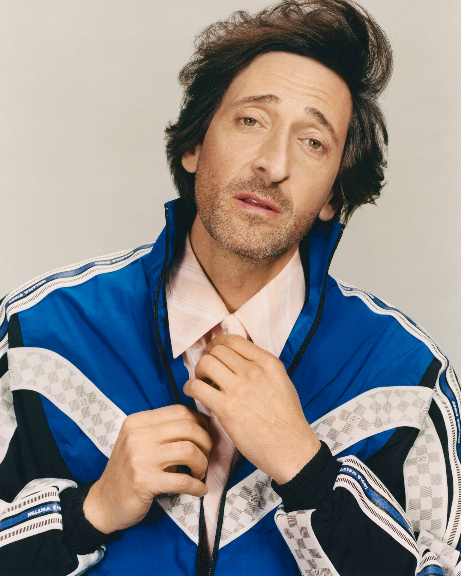Adrien Brody In A Blue Jacket Background