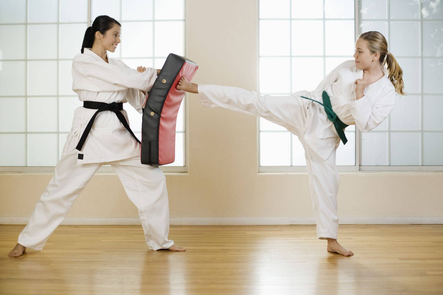 Advanced Karate Student Perfecting His High Kick