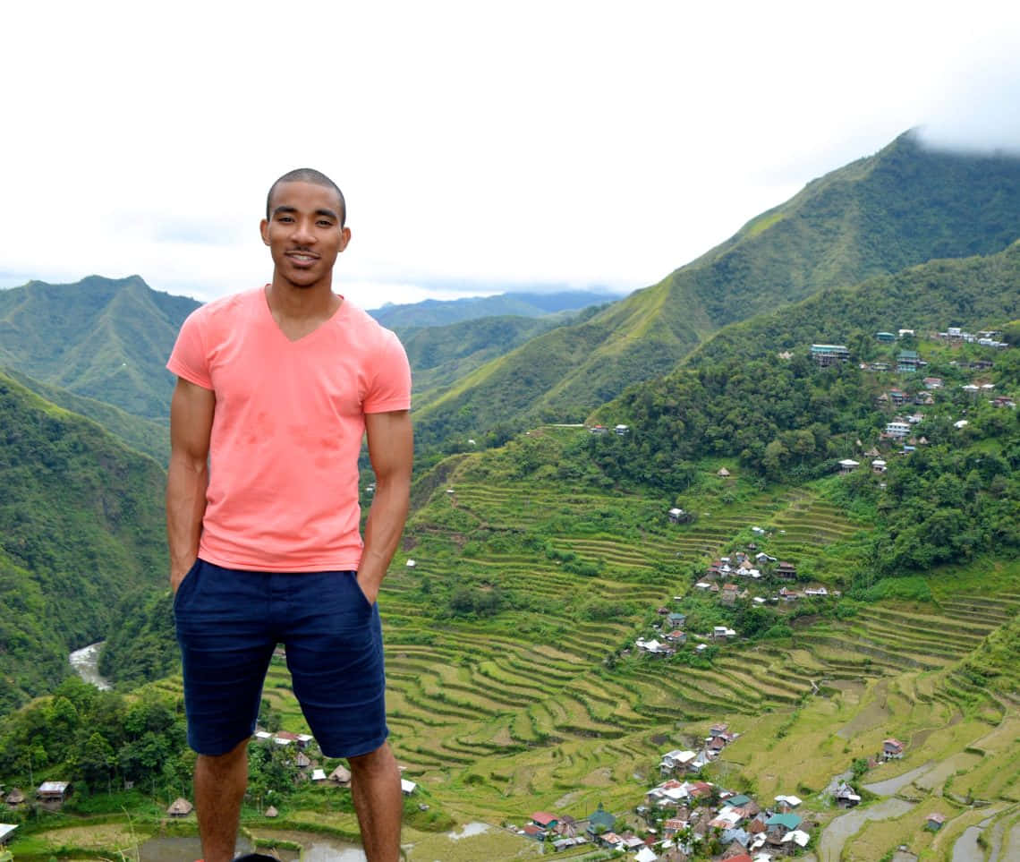 Adventurous Male Tourist Experiencing The Beauty Of Banaue Rice Terraces