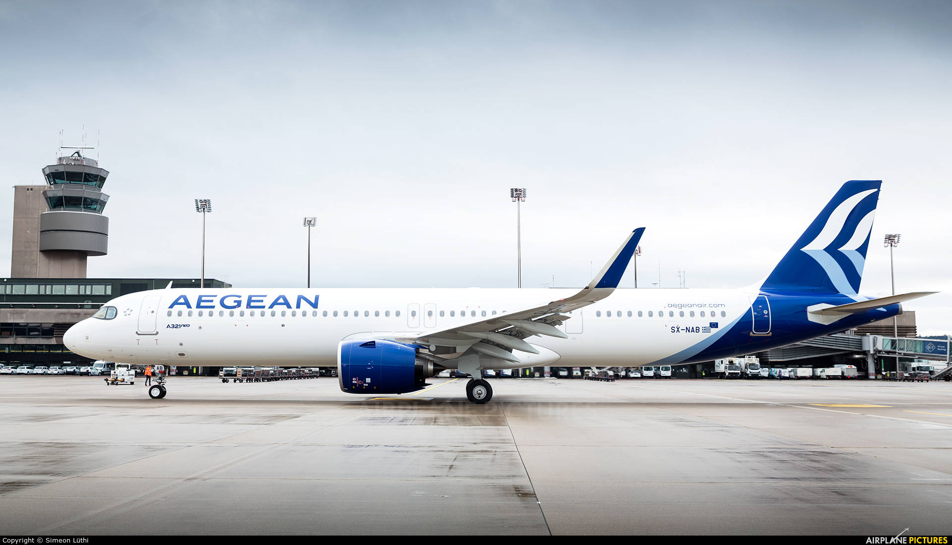 Aegean Airlines A321neo In Flight With Air Traffic Control Tower In View