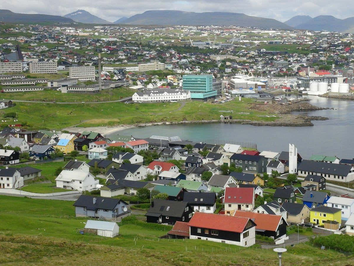 Aerial Photo Of Houses In Thorshavn Background