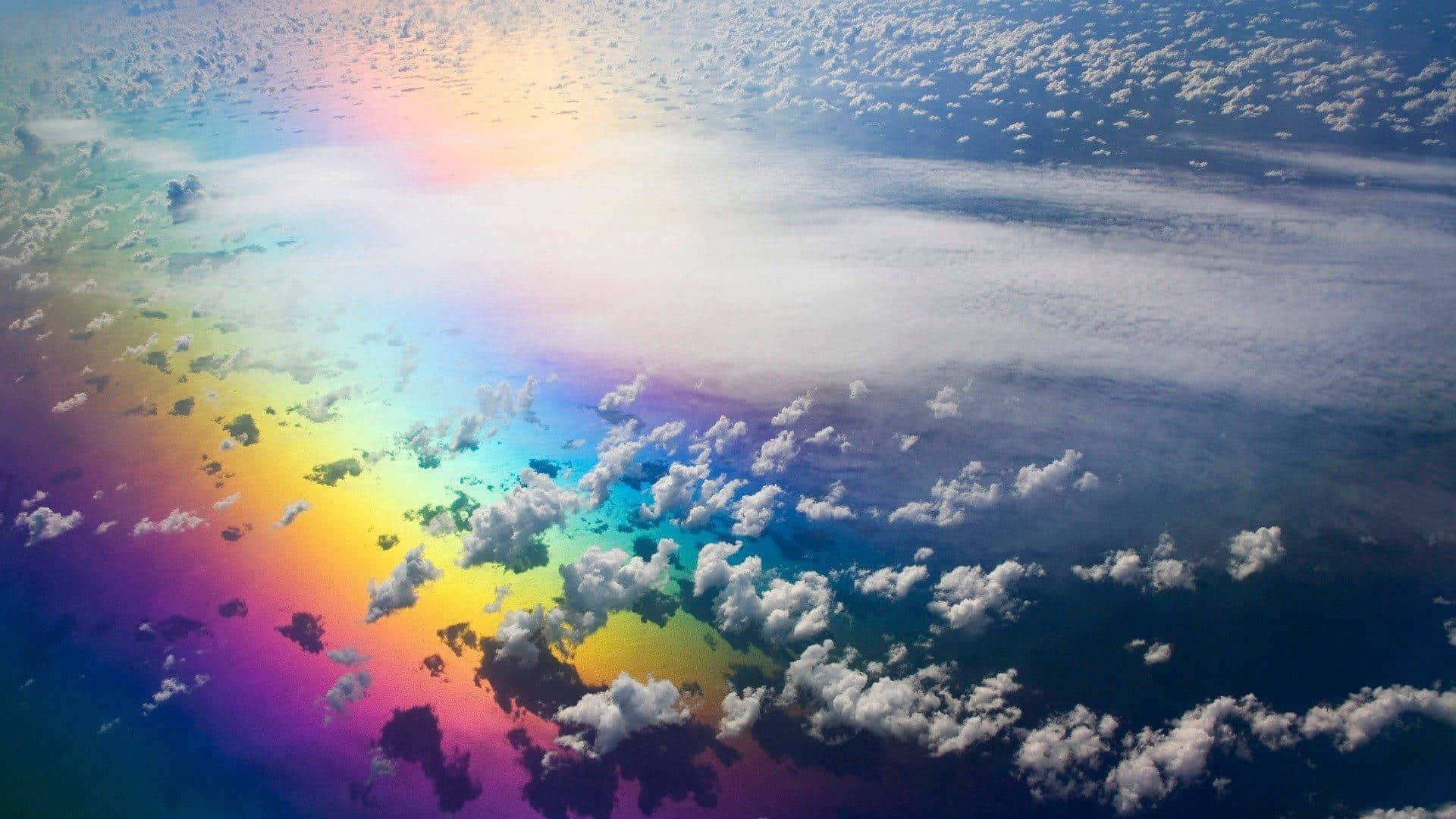 Aerial_ Rainbow_ Cloudscape Background
