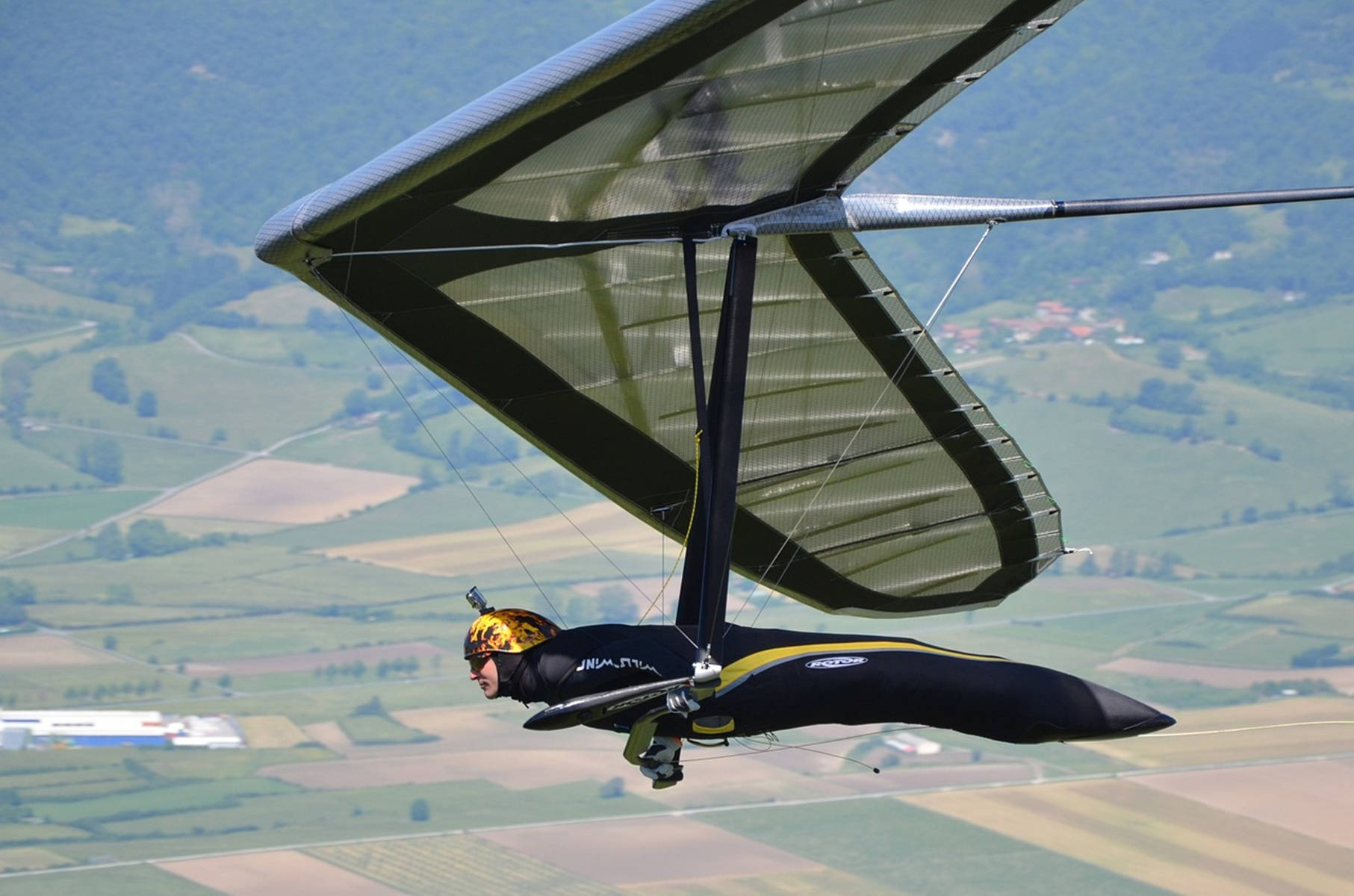 Aerial Reflection Of Freedom - Hang Gliding Over Rio's Landscape Background