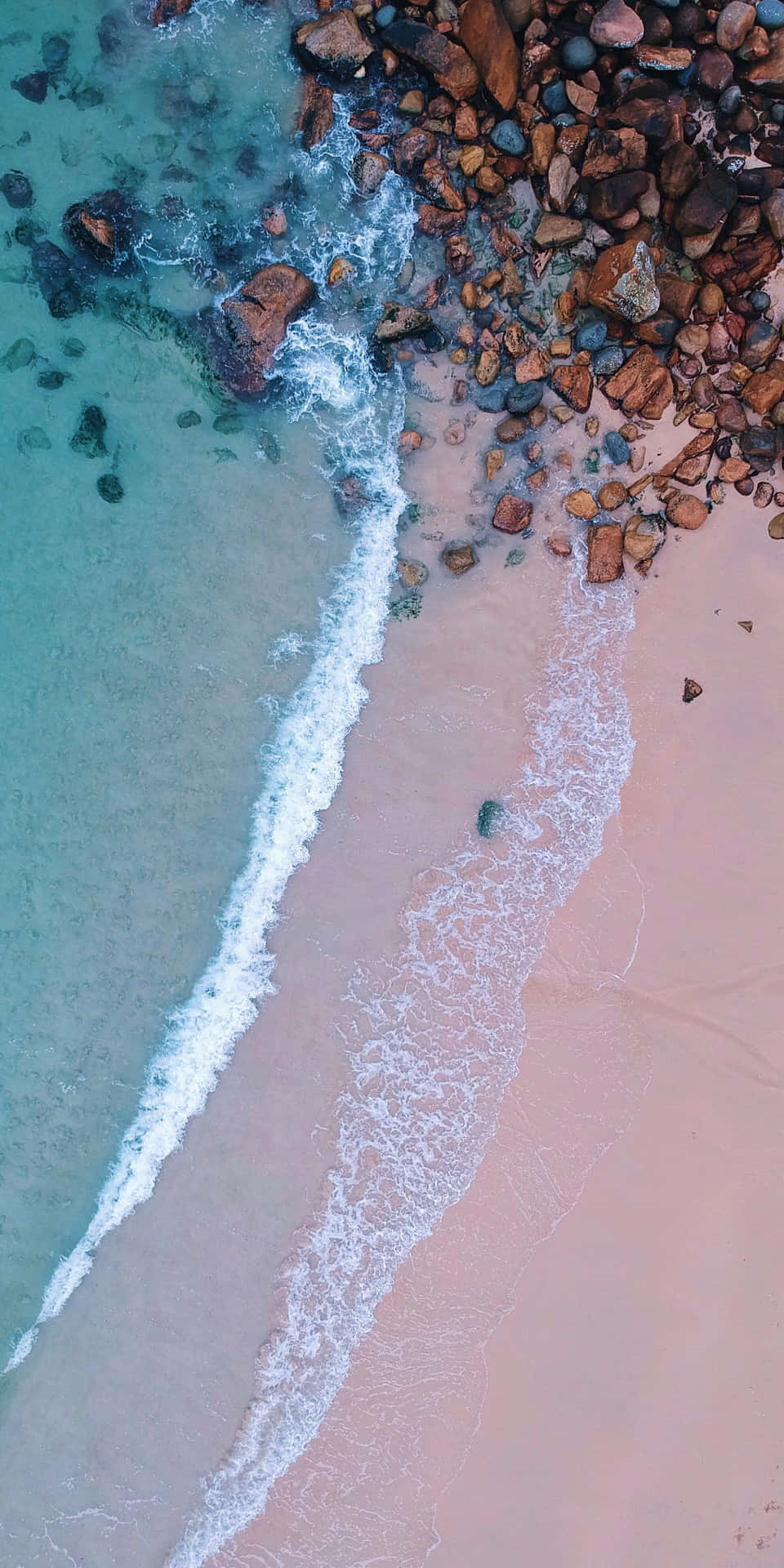 Aerial_ View_ Crystal_ Clear_ Waters_and_ Rocky_ Shoreline.jpg Background