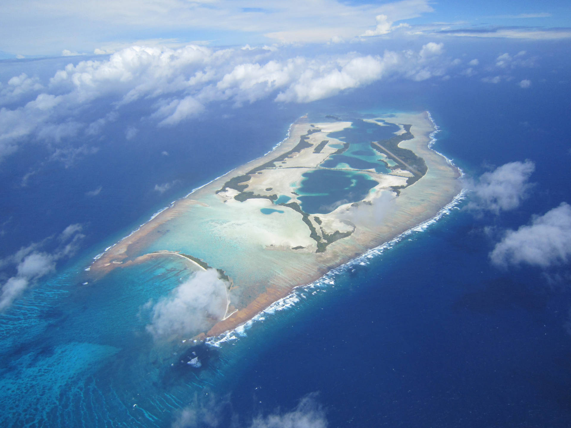 Aerial View Of Palmyra Atoll Background