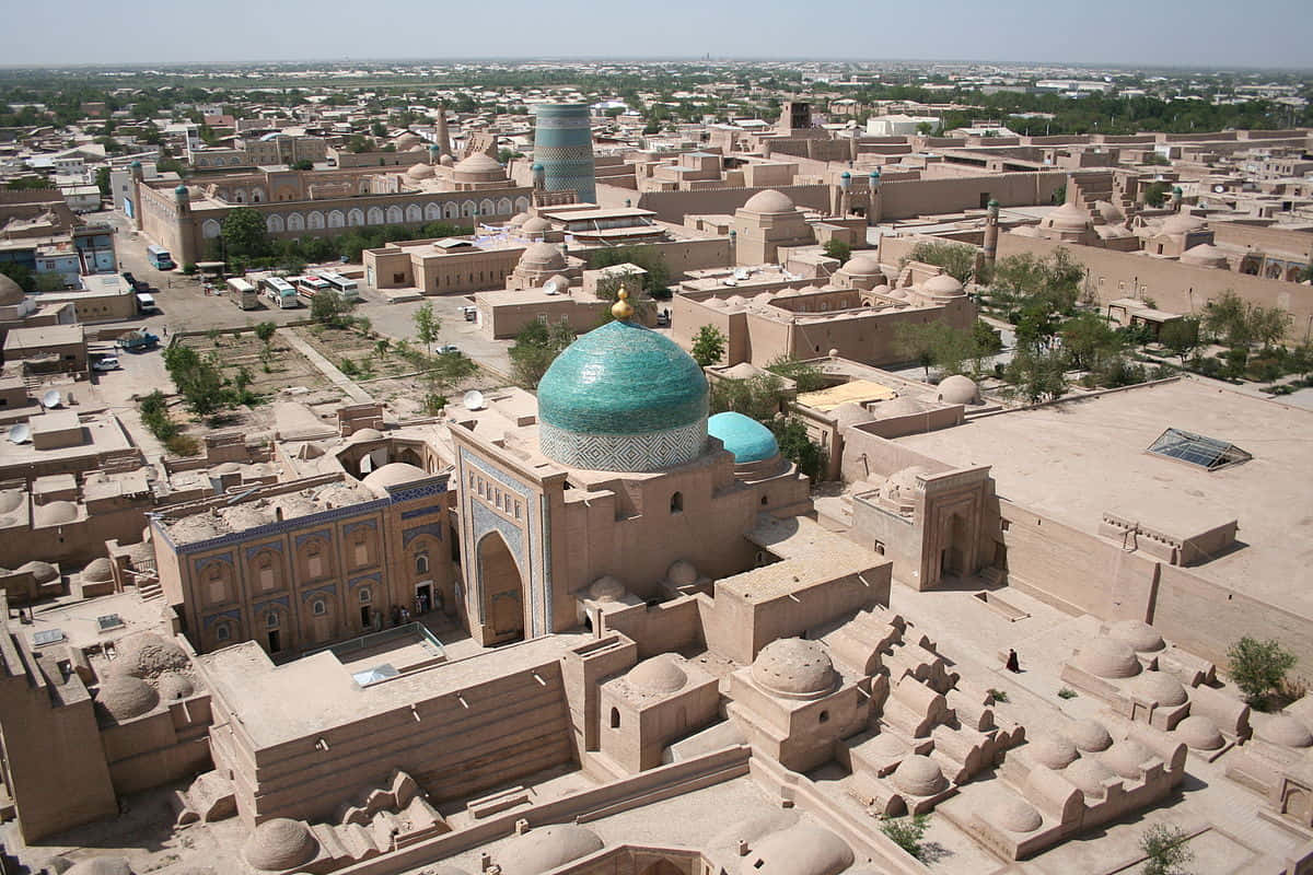 Aerial View Of The Majestic Blue Dome In Khiva Background