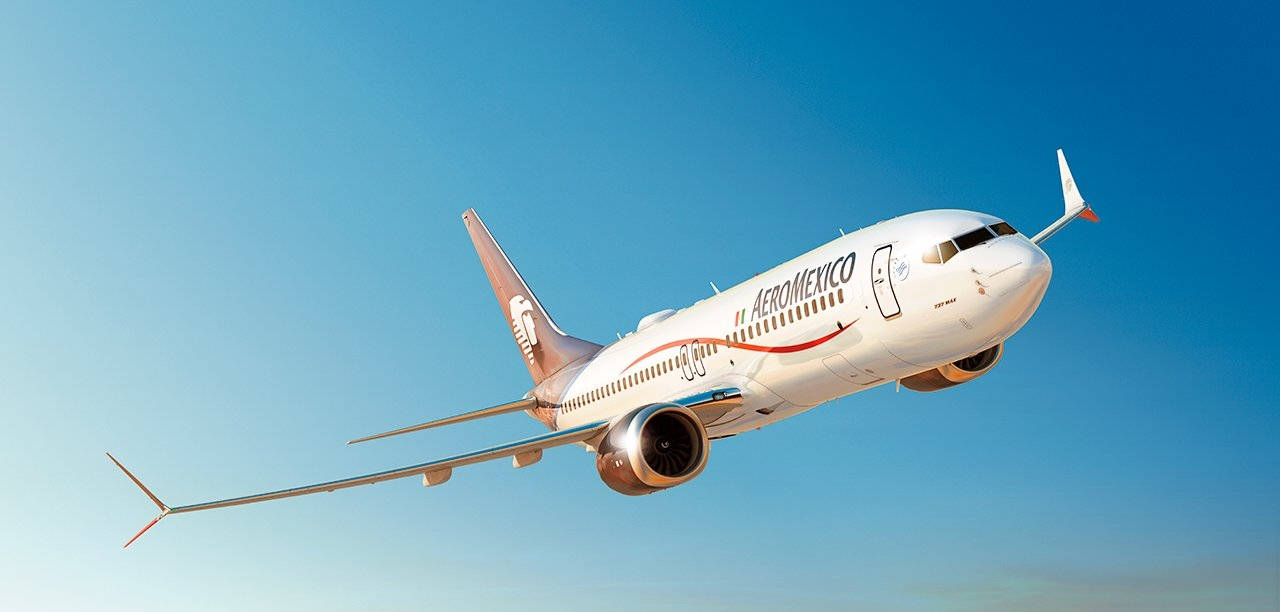 Aeromexico Airline Boeing 737-800 In Clear Sky Background