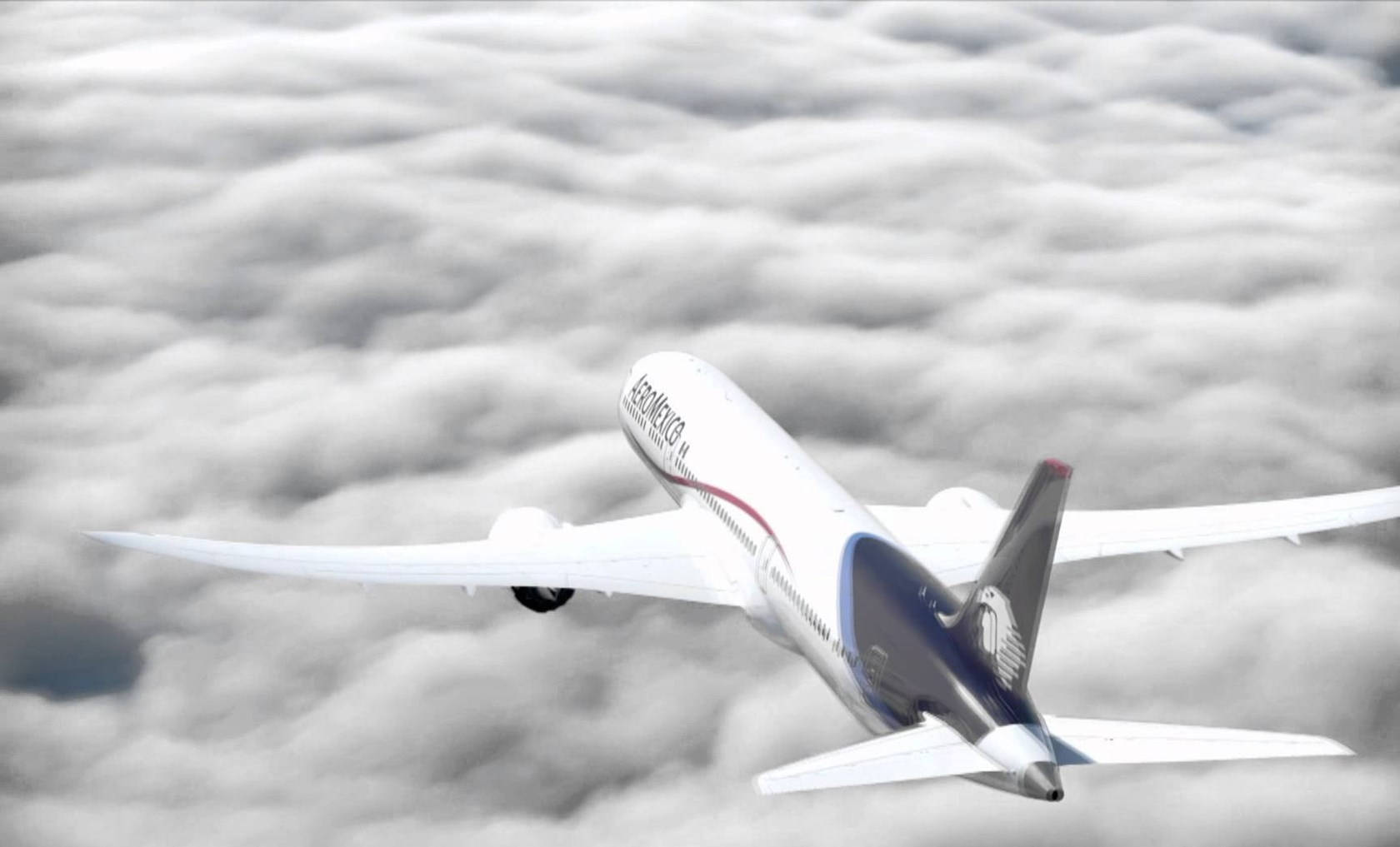 Aeromexico Boeing 787-9 Dreamliner Flying Over Gray Clouds Background