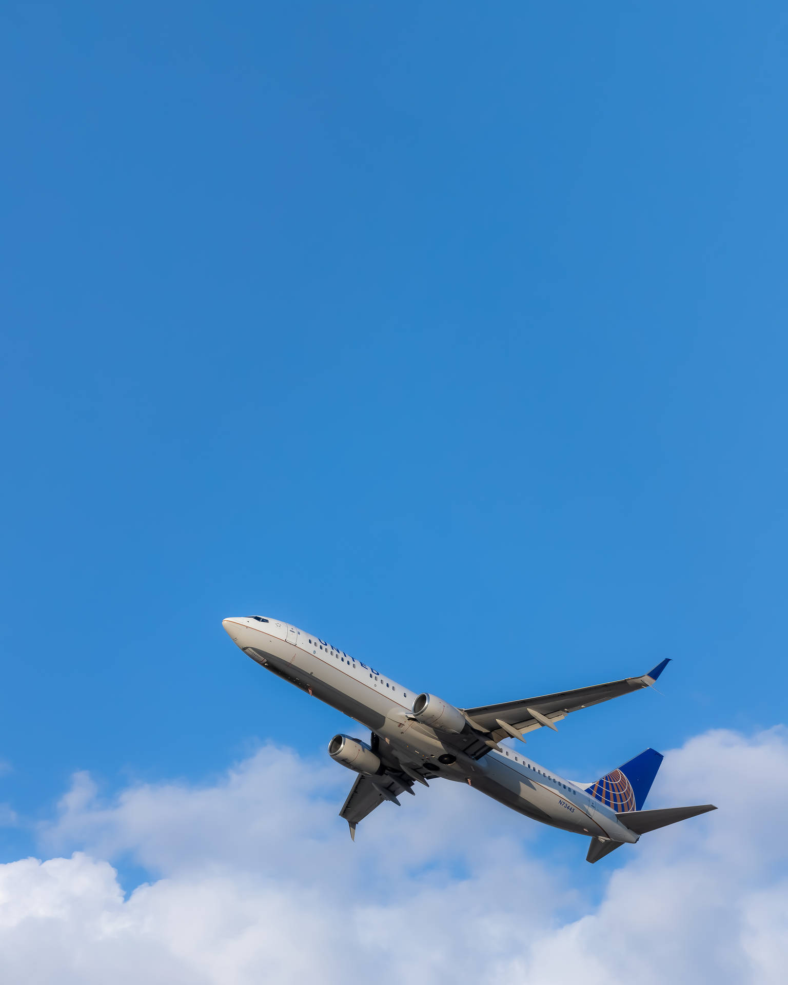 Aeroplane Cloudy Blue Sky Background