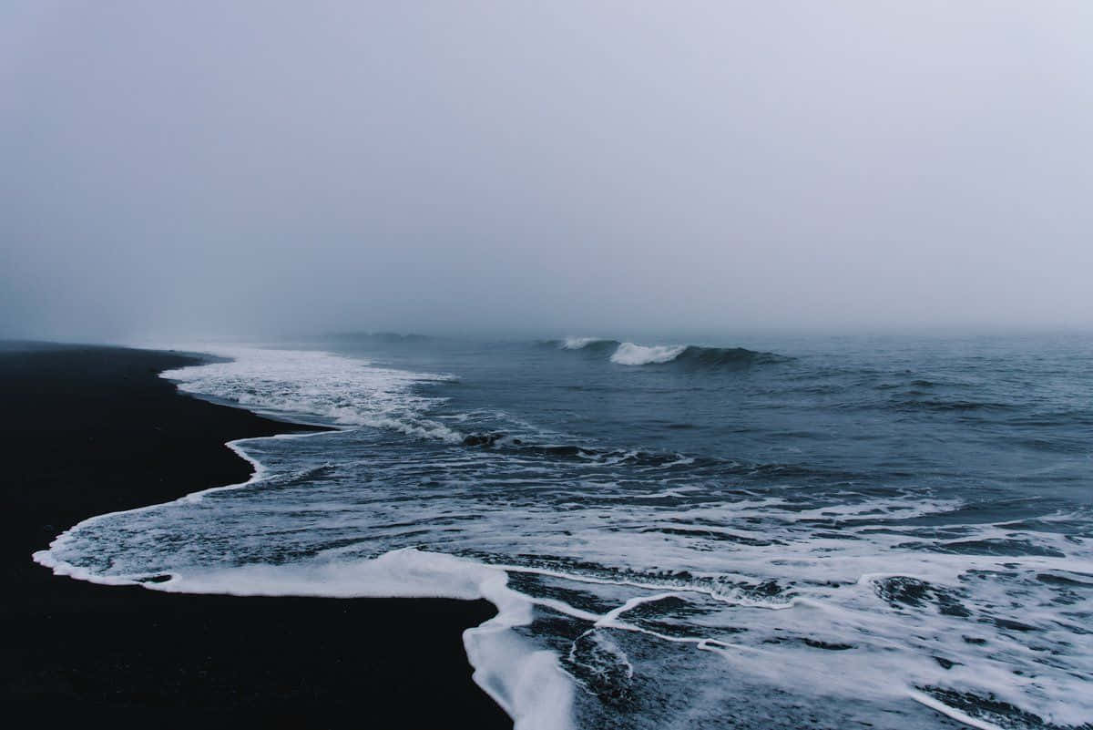 Aesthetic Beach Laptop During Fog Background