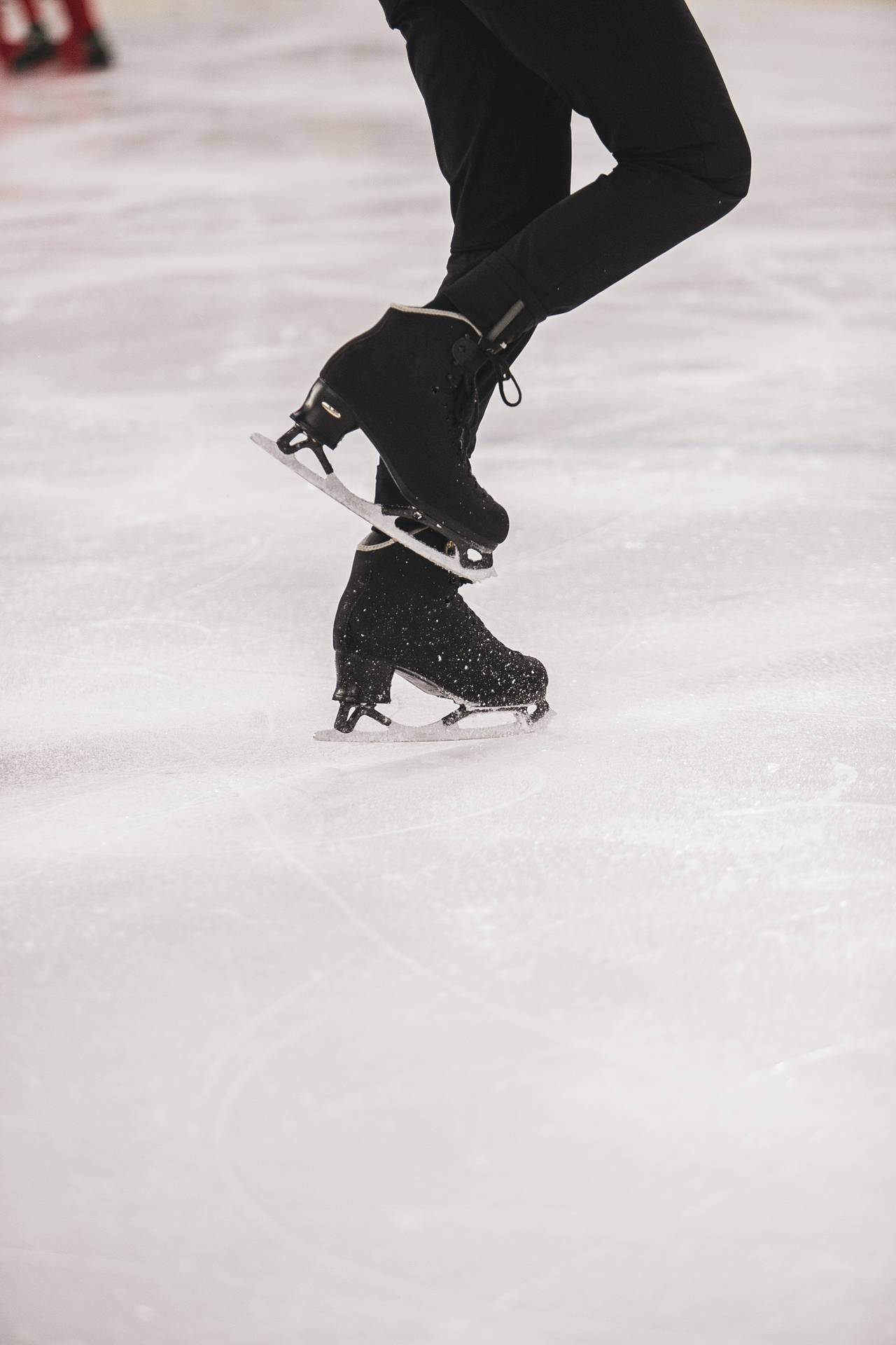 Aesthetic Black Ice Skating Boots Background