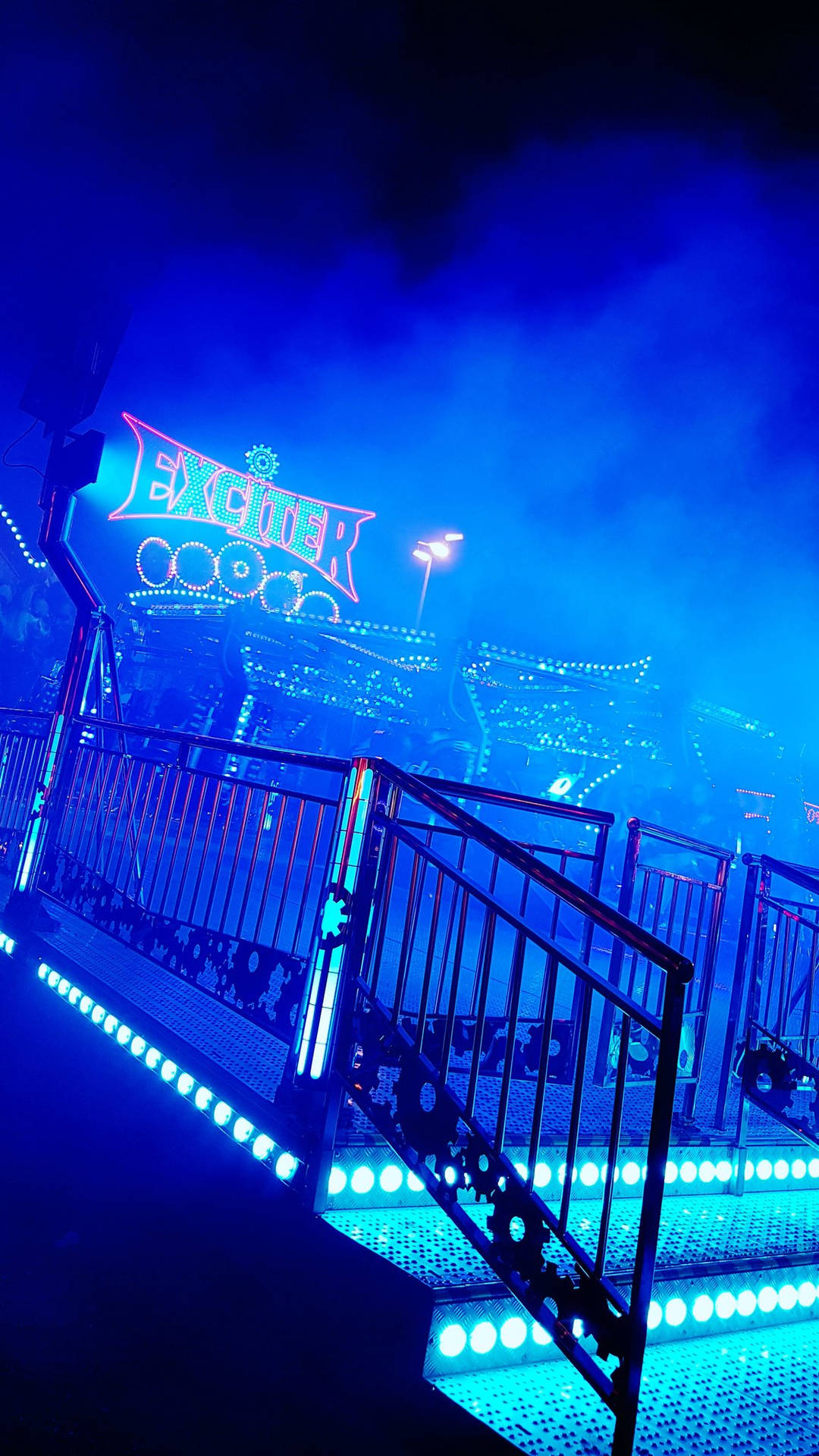 Aesthetic Blue Amusement Park Ride Background