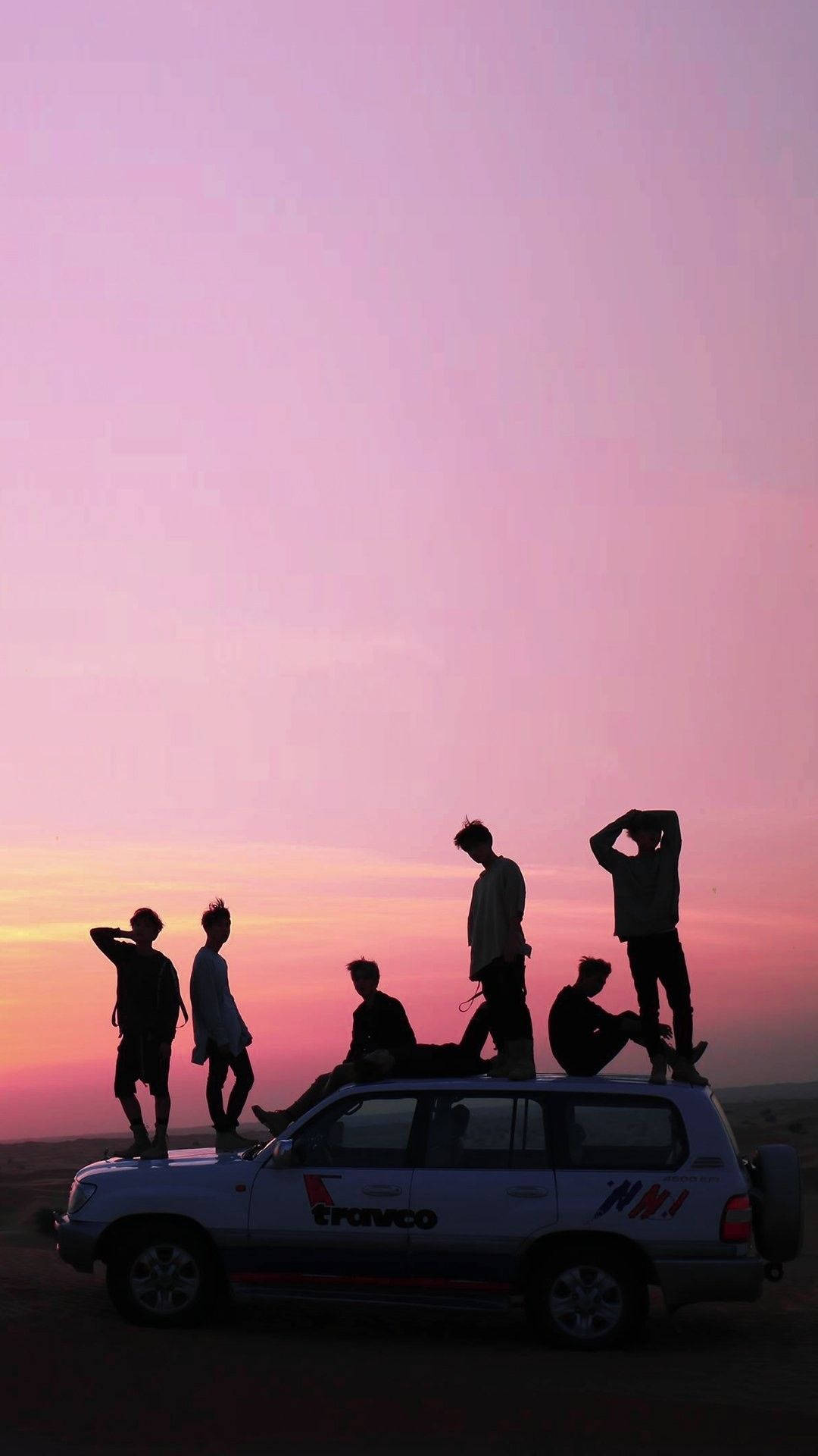 Aesthetic Bts Silhouette On Pink Skies Background