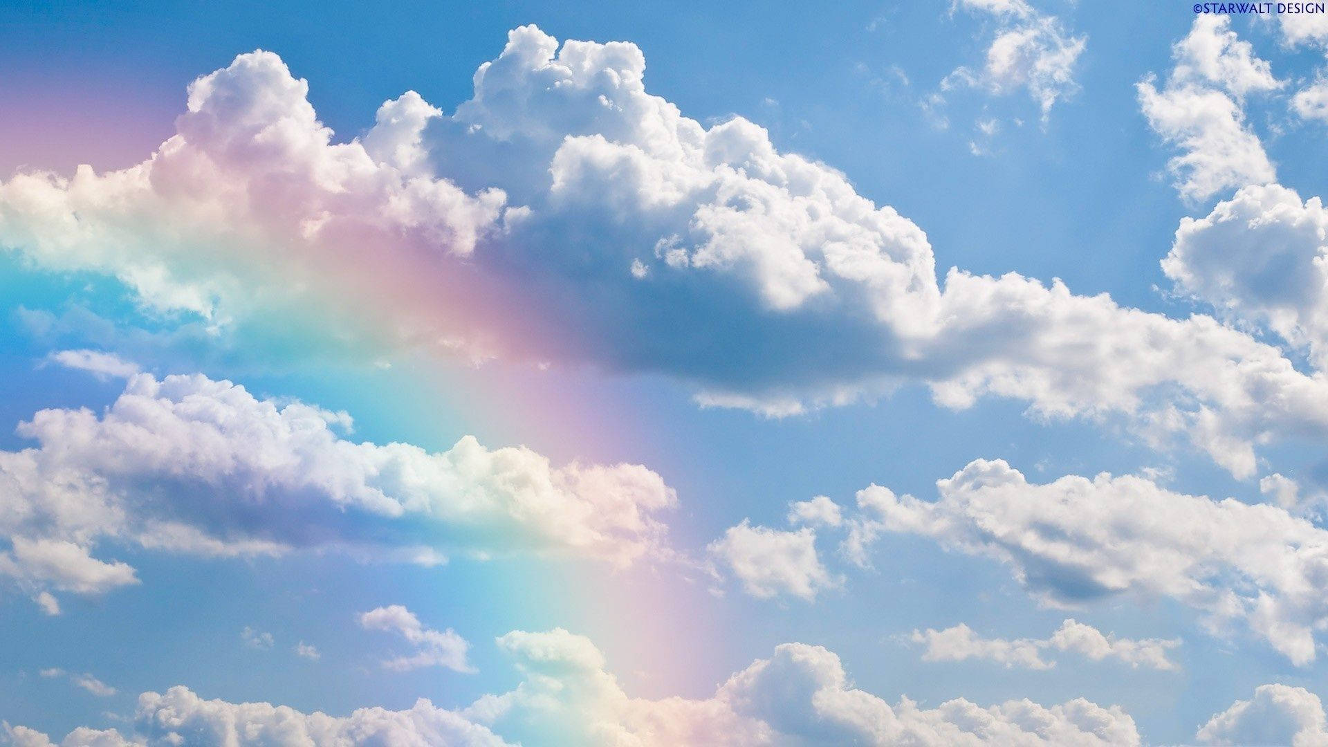 Aesthetic Cloud With A Rainbow Background
