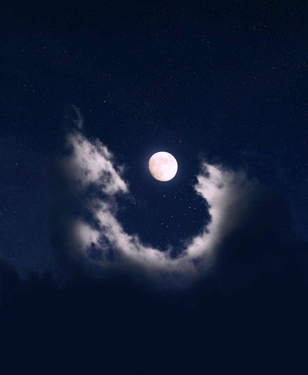 Aesthetic Clouds Surrounding The Moon