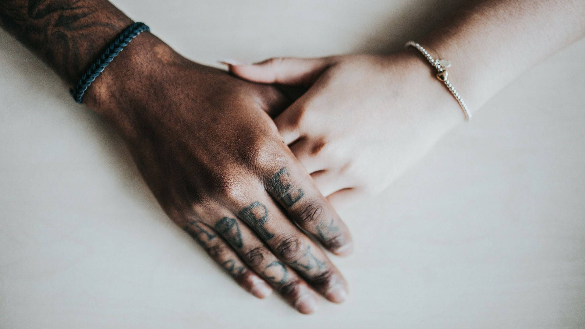 Aesthetic Couple's Hand In White