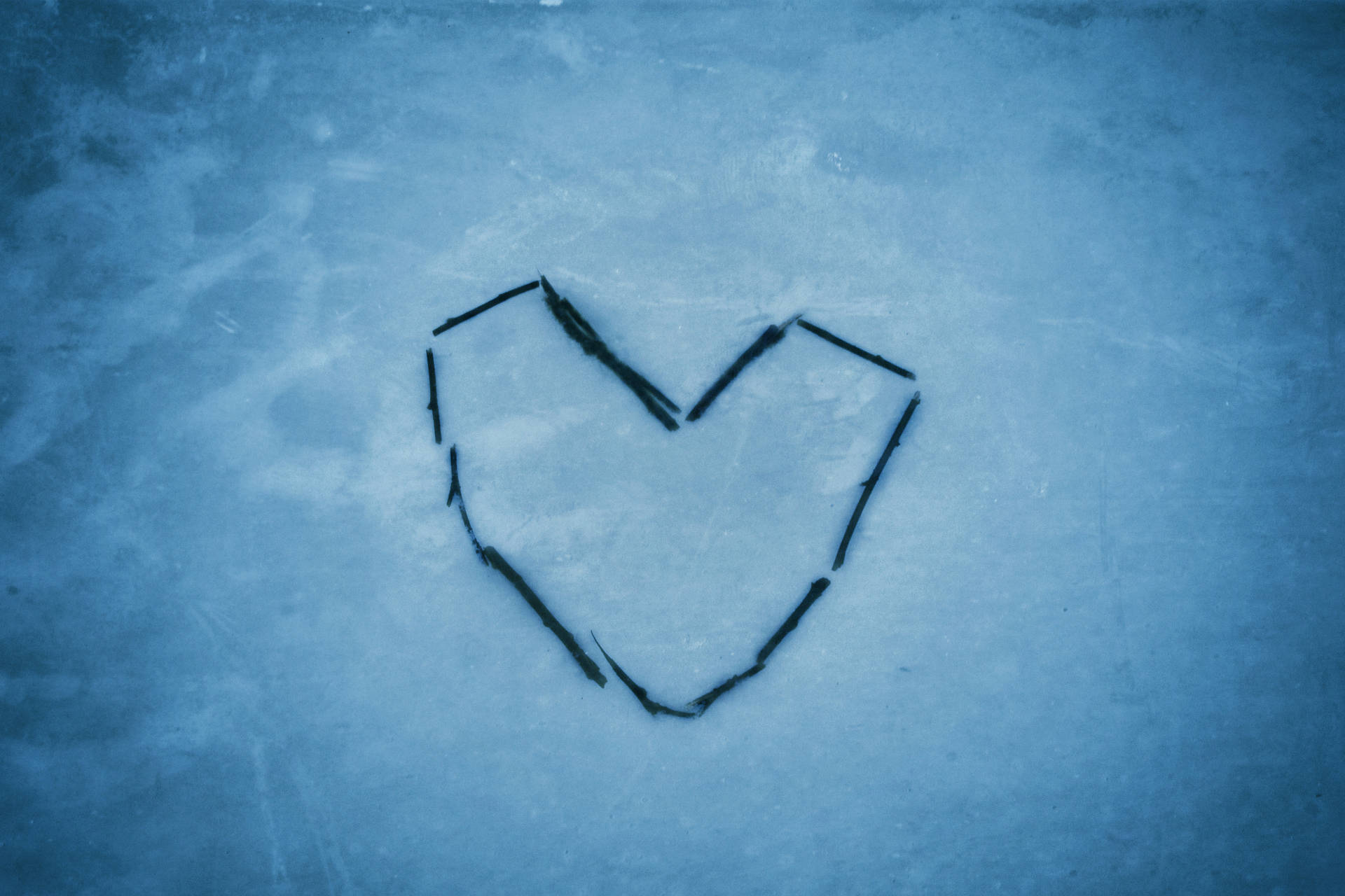 Aesthetic Heart Symbol In The Snow Background