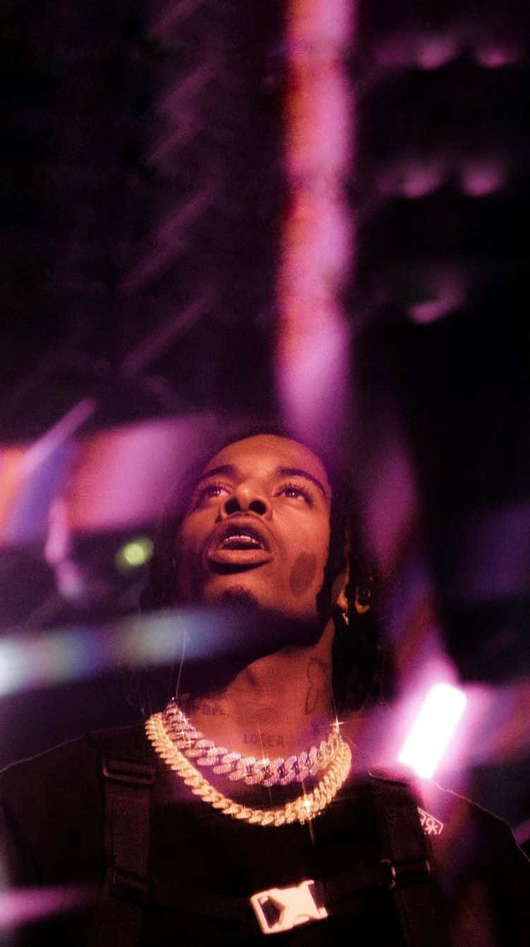 Aesthetic Rapper In The Spotlight Background