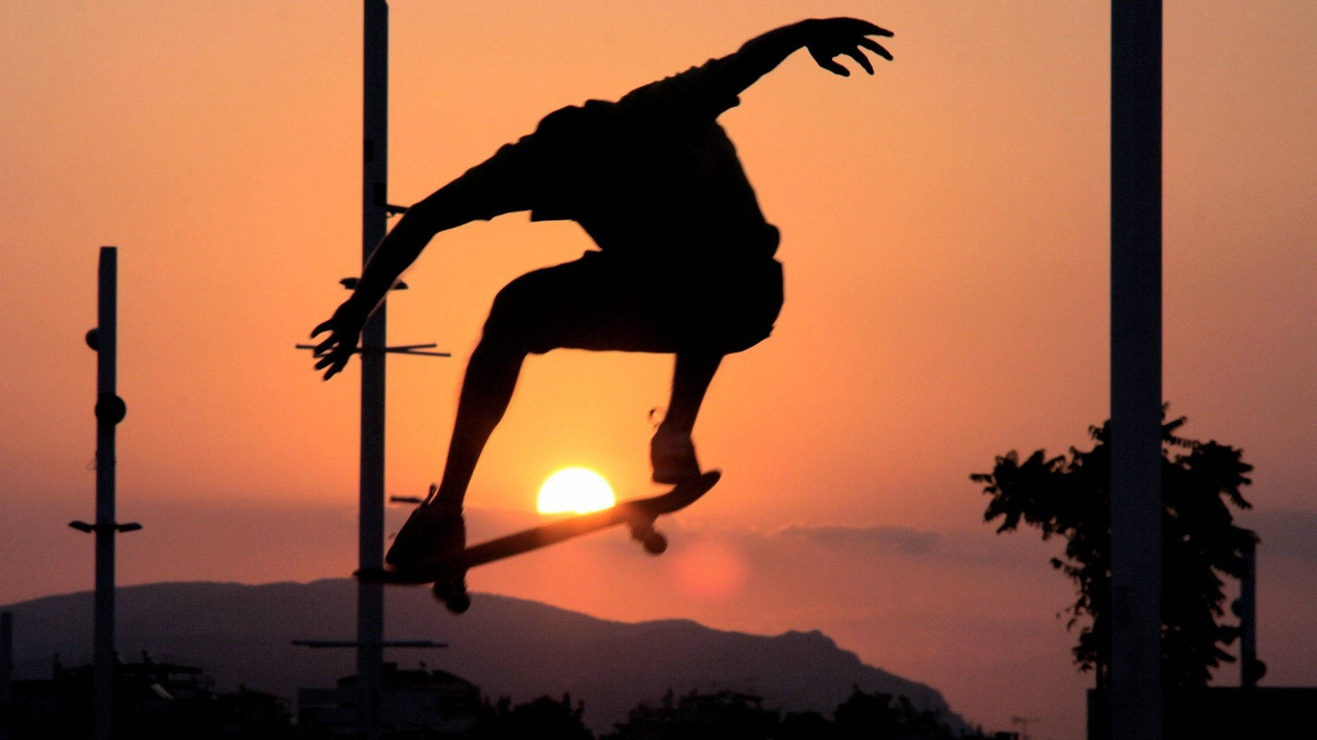 Aesthetic Skater Boy With Sunset Background