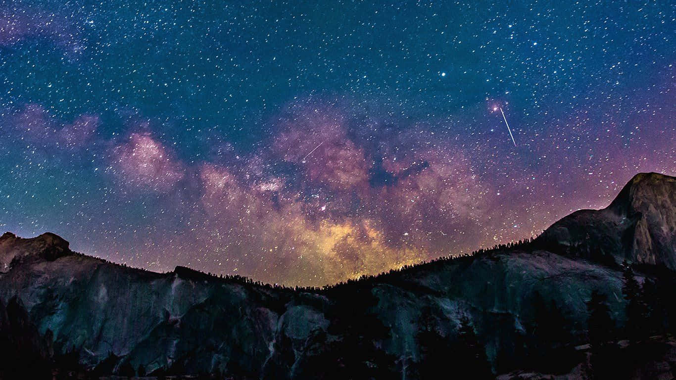 Aesthetic Stars Over The Mountain Laptop Background
