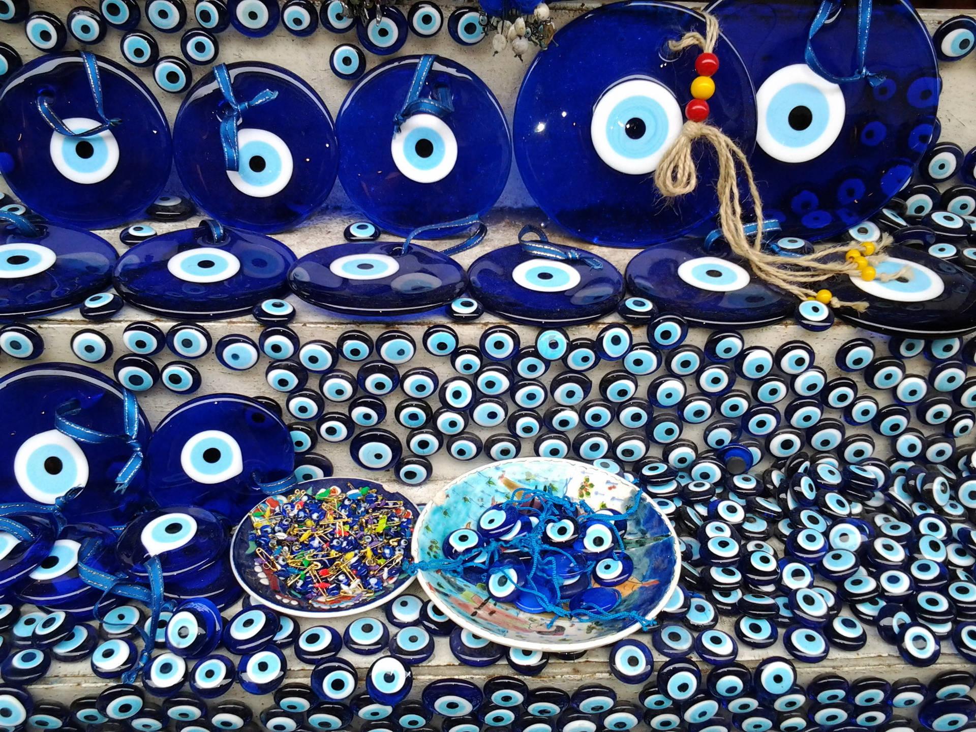 Aesthetic Turkish Evil Eye Souvenir On Display Background