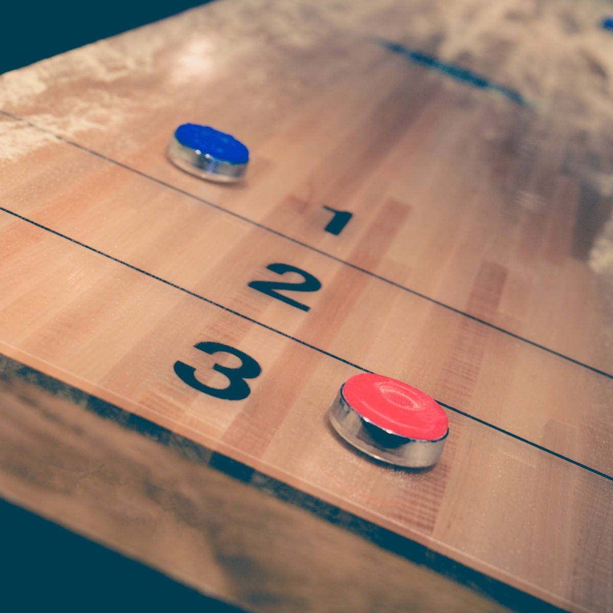 Aesthetic Vintage Shuffleboard Game With Puck Background