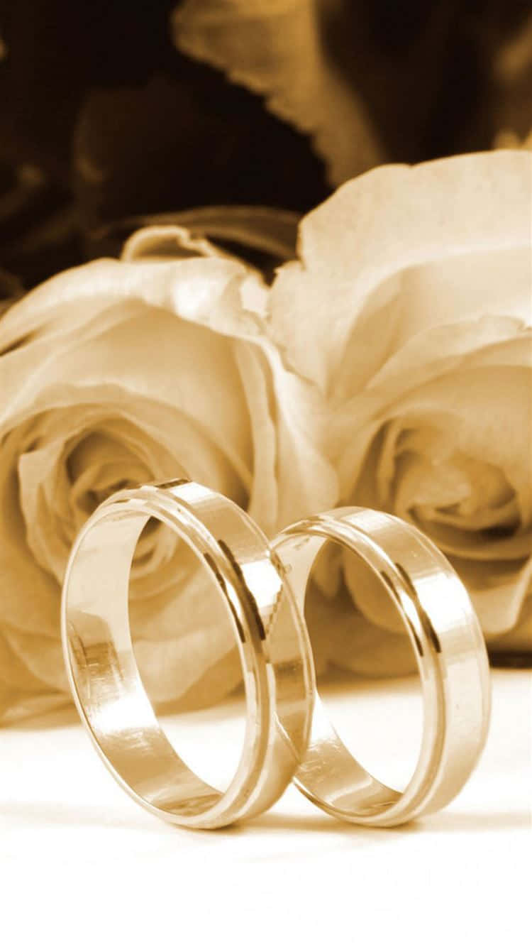 Aesthetic Wedding Ring With Flowers Background