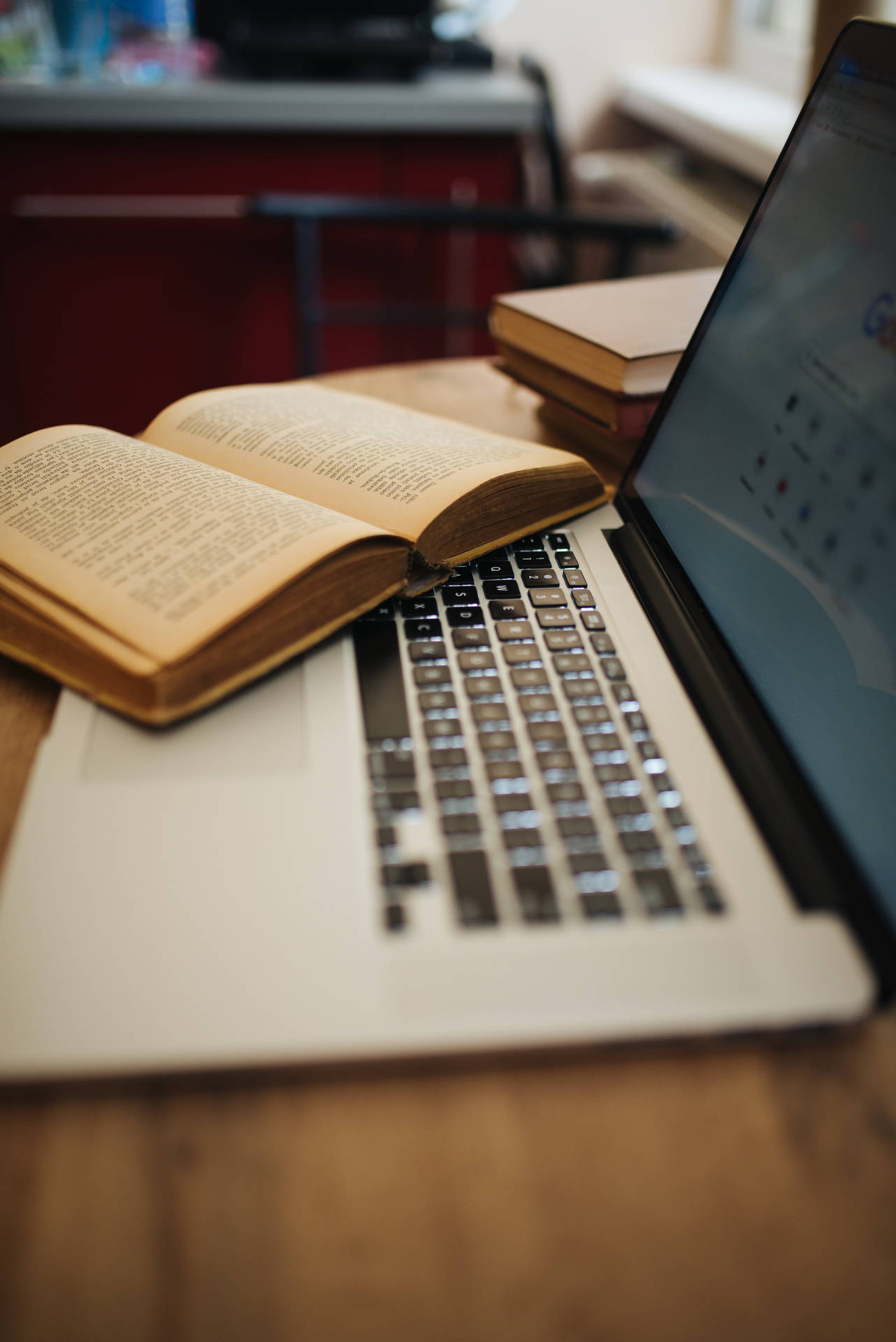 Aesthetically Pleasing Desk Setup With Books