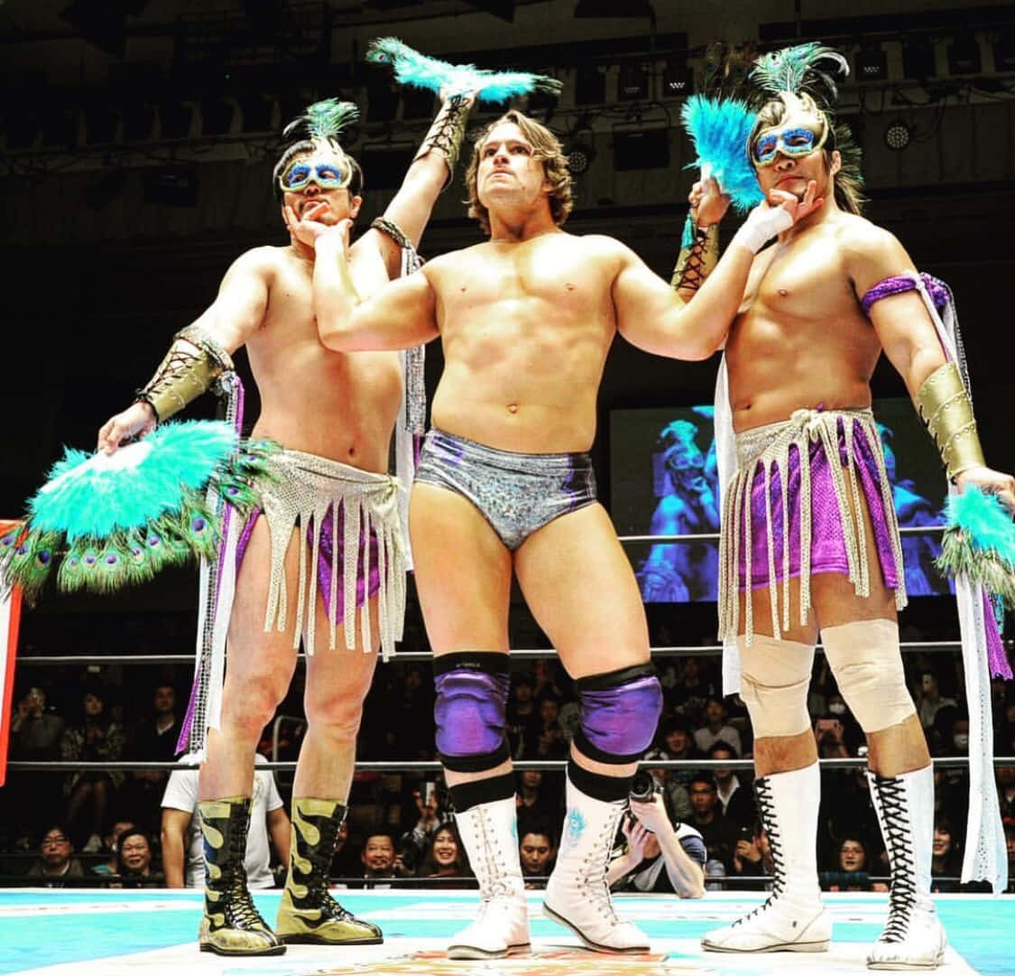 Aew Wrestler Dalton Castle With Hiroshi Tanahashi And Ryusuke Taguchi Background