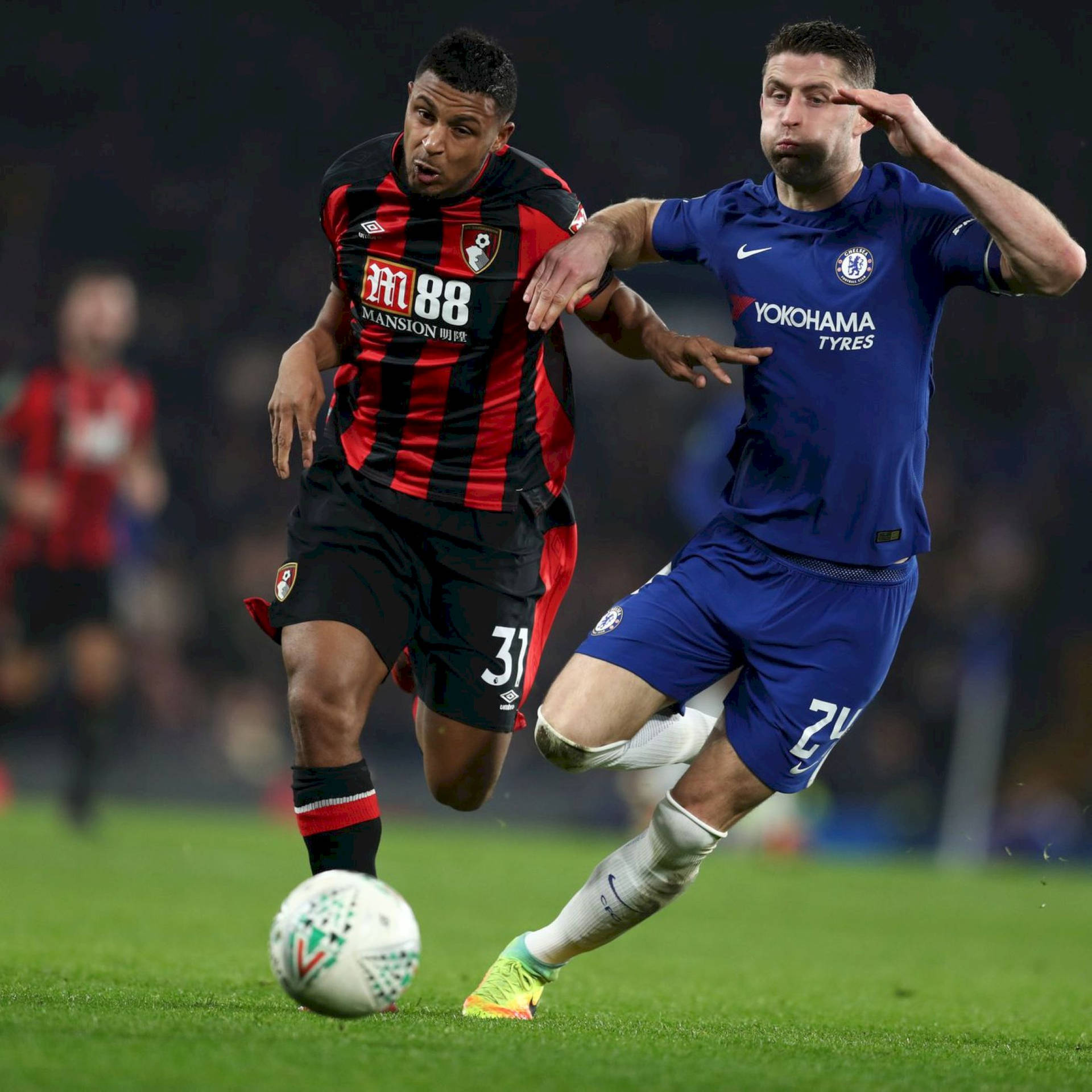 Afc Bournemouth Player Against Opponent Background