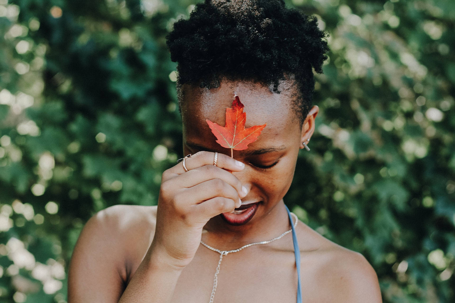 African Girl With Maple Leaf Background