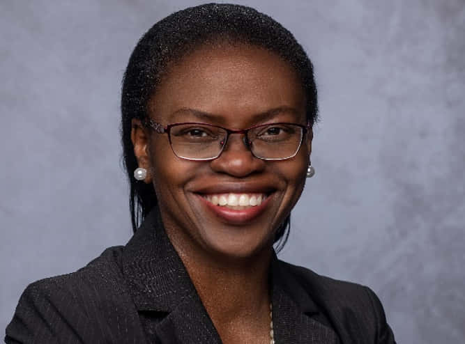 African Intellect - Portrait Of A Nigerian Woman With Eyeglasses Background