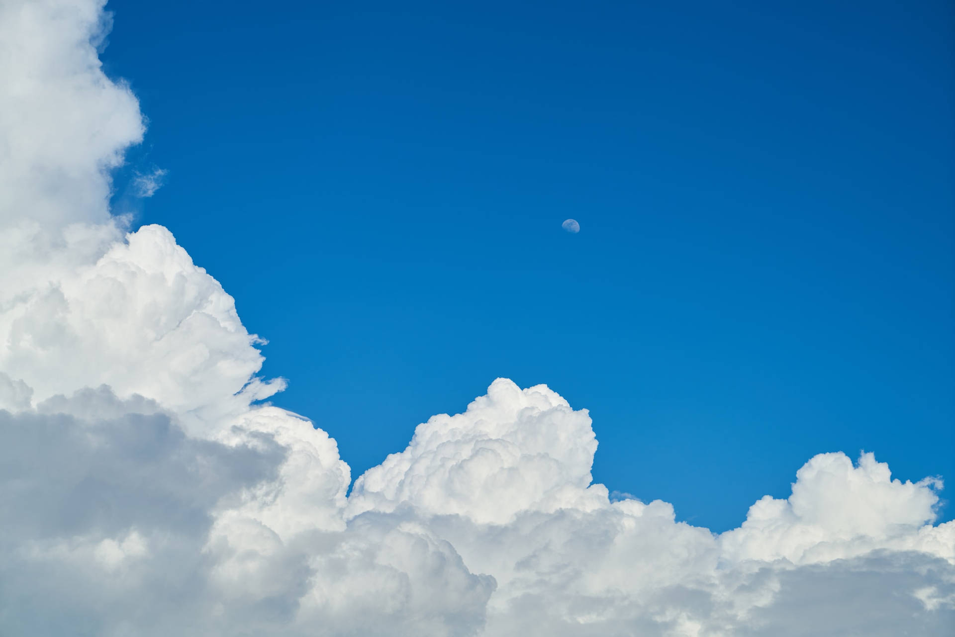 Afternoon Blue Cloudy Sky With Moon Background