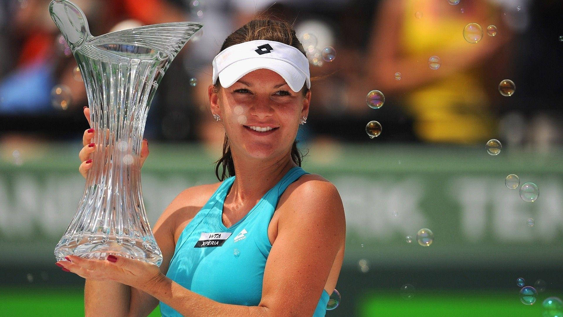 Agnieszka Radwanska Holding Her Trophy Background