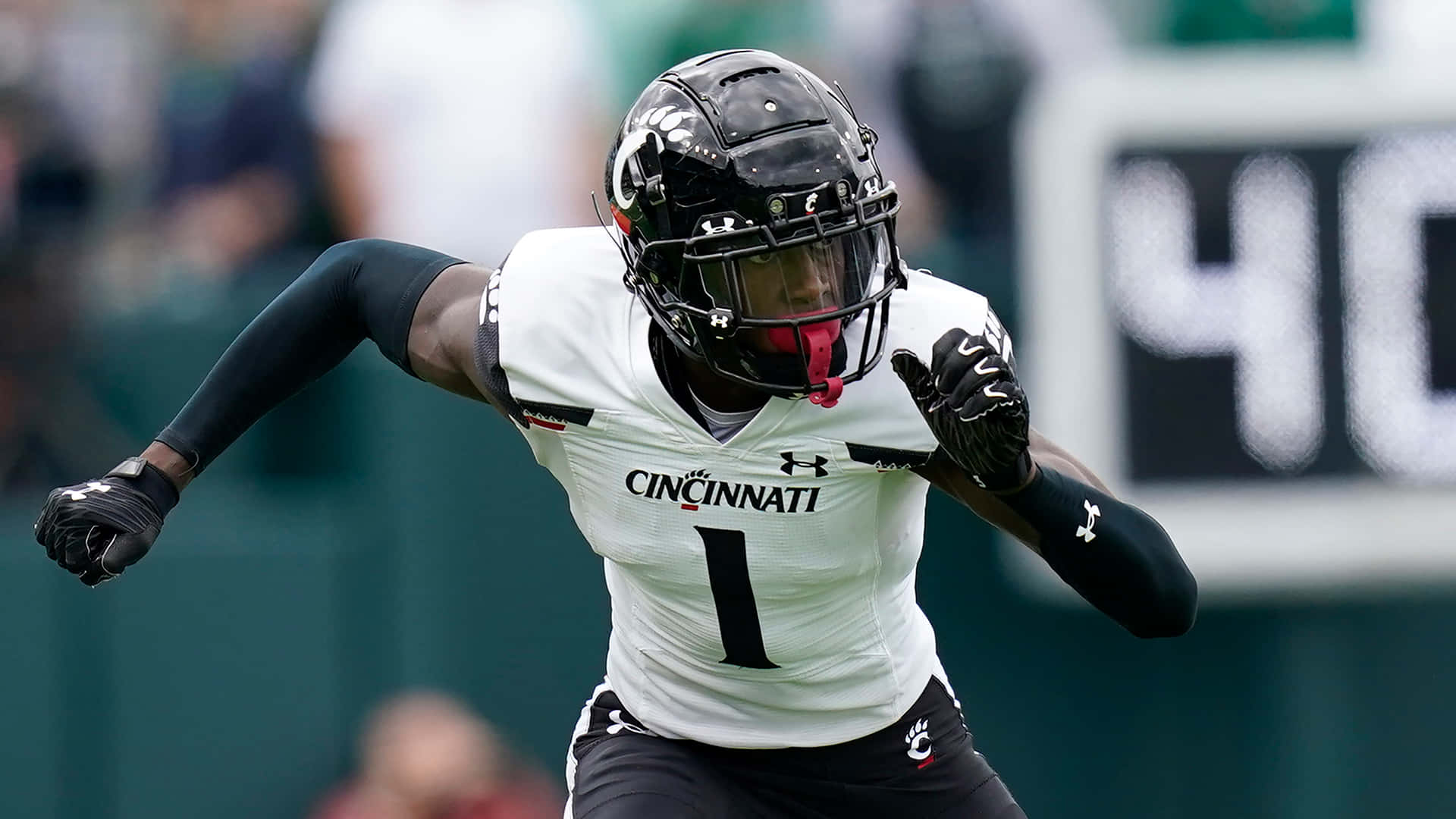 Ahmad Gardner In Action During A College Football Game For Cincinnati