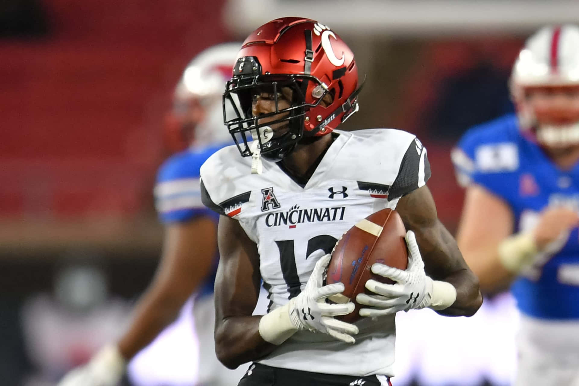 Ahmad Gardner Of Cincinnati Bearcats Strides With An Interception Background