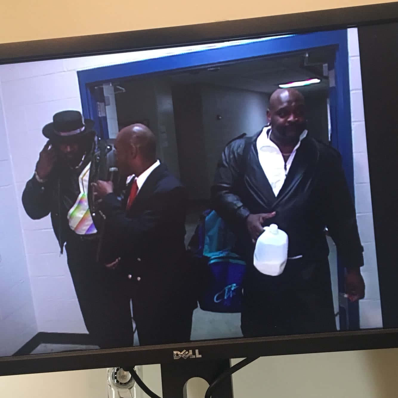 Ahmed Johnson Caught In A Candid Backstage Moment Background