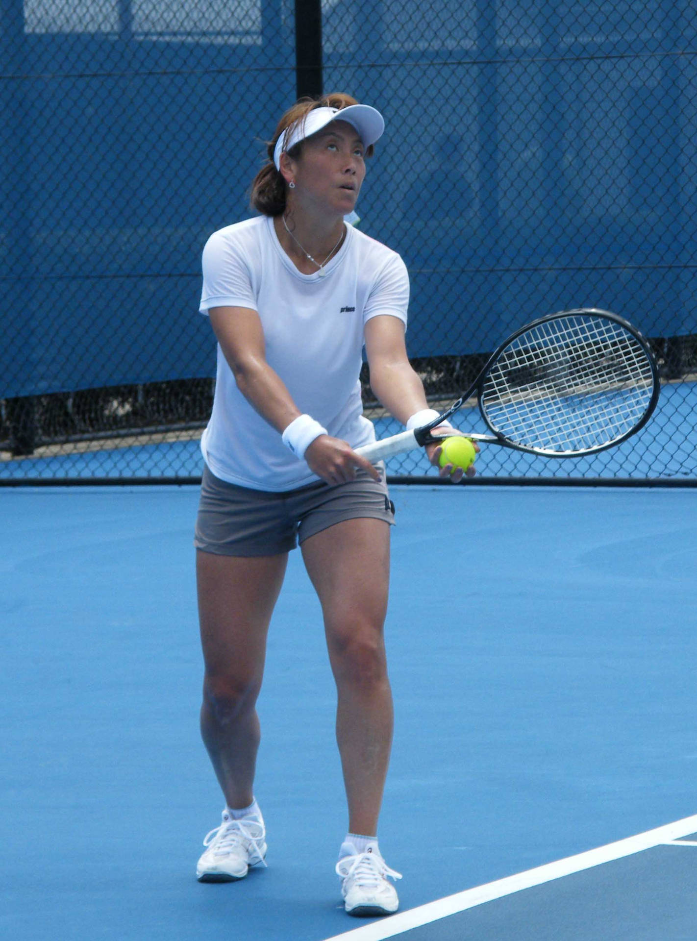 Ai Sugiyama About To Serve Tennis Ball Background