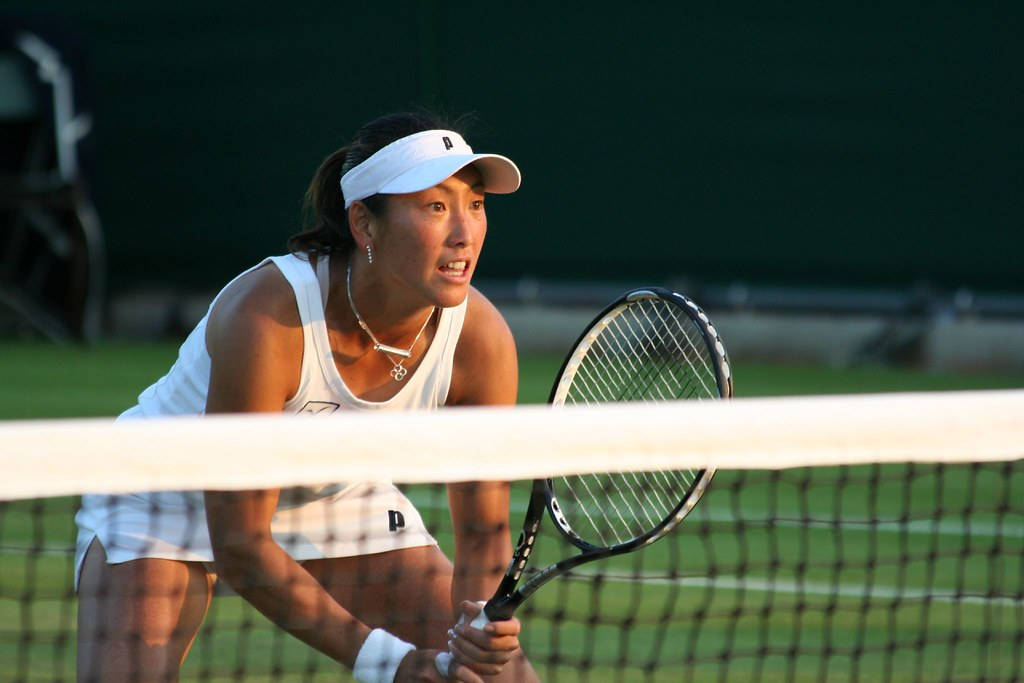 Ai Sugiyama In Ready Position Near Net Background