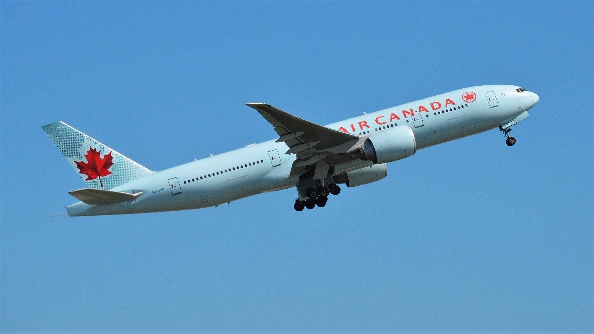 Air Canada Airship In The Blue Sky Background