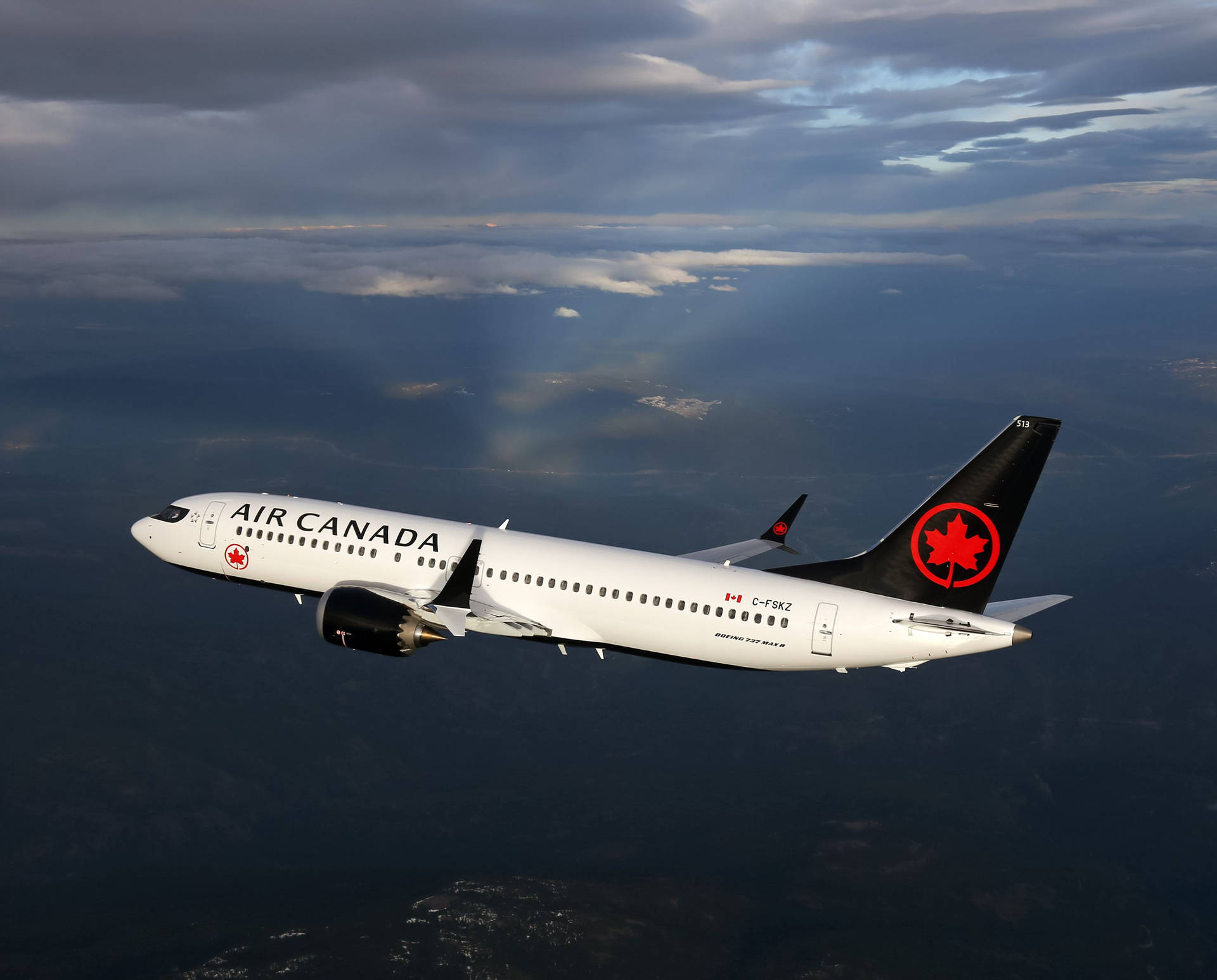 Air Canada Plane Above The Sea Background