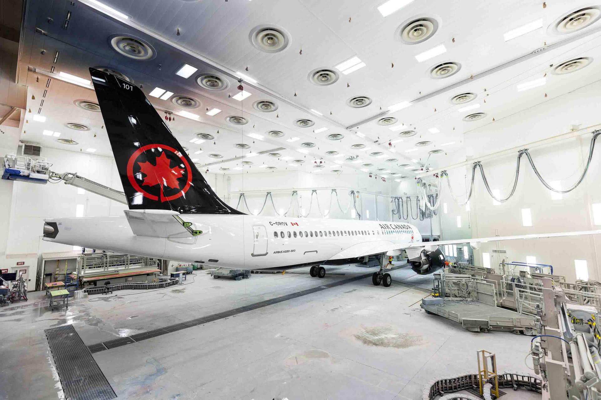 Air Canada Plane In Hangar Background