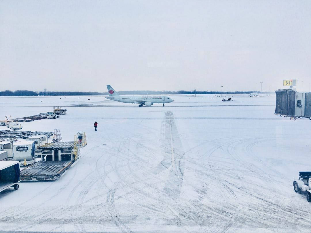 Air Canada Plane In Snow Background