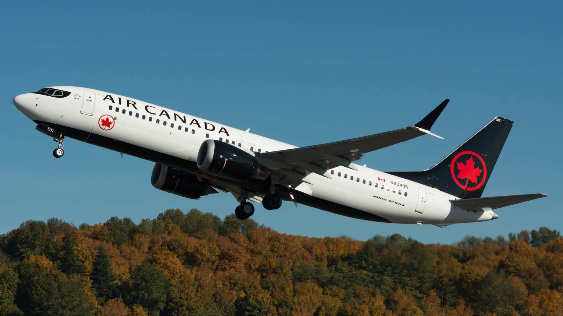 Air Canada Plane With Green Forest Background