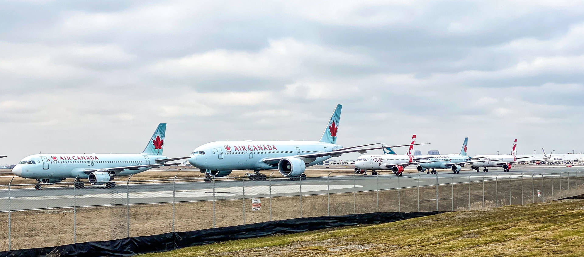 Air Canada Planes On Runway Background