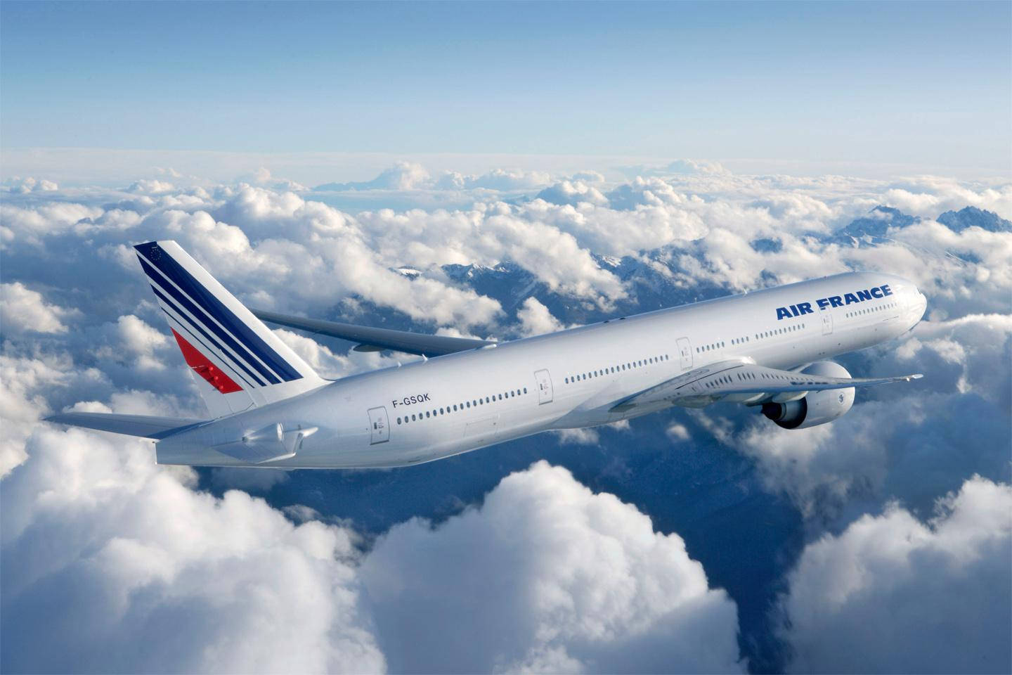 Air France Airline Boeing 777 Plane Over Clouds Background